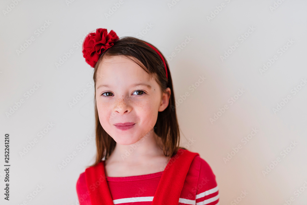 Portrait of young girl wearing red Portrait of young girl wearing red