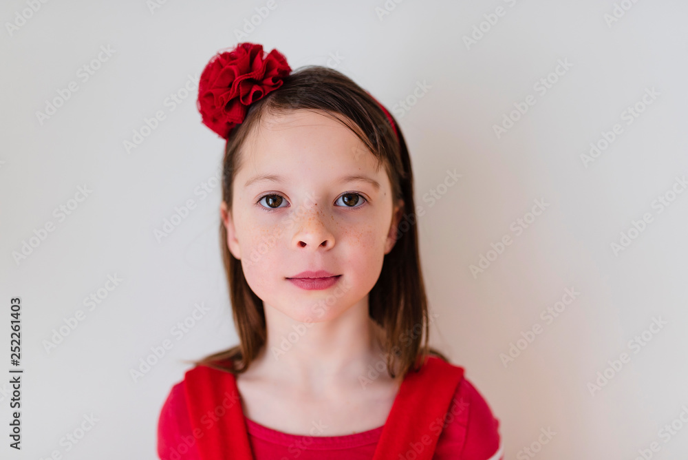 Portrait of young girl wearing red Portrait of young girl wearing red