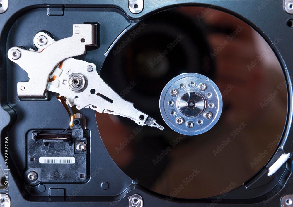 opened hard disc drive. computer hdd inside. opened hard disc drive. computer hdd inside.