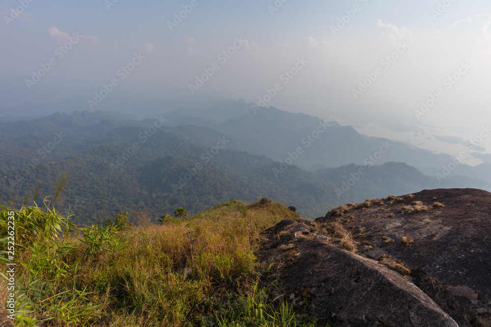 big stone on top of the mountain and tree at thong pha phum national park, kanjanaburi, Thailand