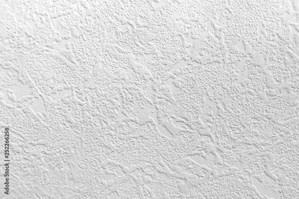 Light background. Abstract texture of vinyl wallpaper on the wall Light background. Abstract texture of vinyl wallpaper on the wall