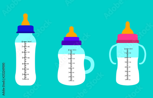 Baby bottles of milk. Flat design.