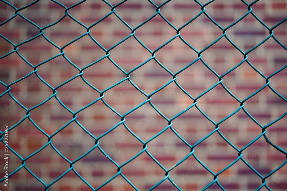 Fototapeta premium fence on a background of blue sky