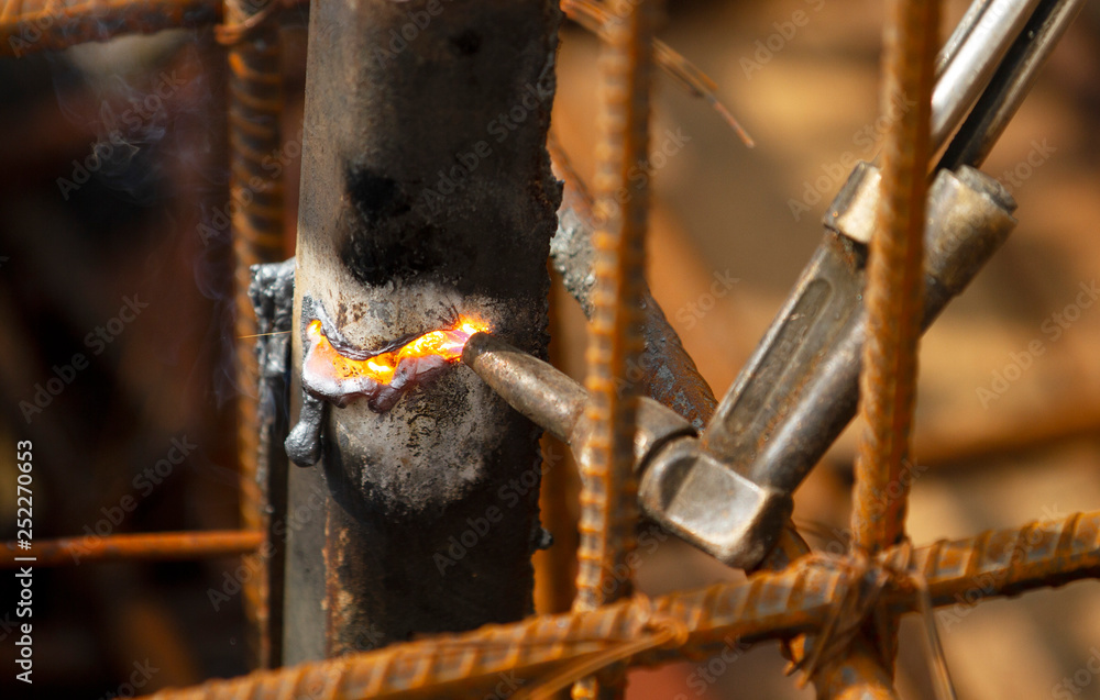 Welder worker perform cutting steel with acetylene torch. Welder worker perform cutting steel with acetylene torch.