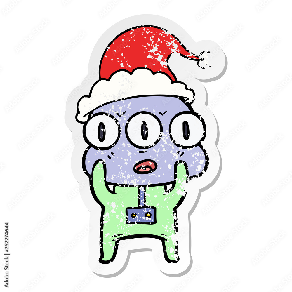 distressed sticker cartoon of a three eyed alien wearing santa hat distressed sticker cartoon of a three eyed alien wearing santa hat