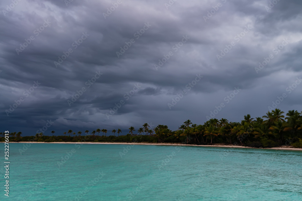 Dominican coast distant view from water on cloudy day Dominican coast distant view from water on cloudy day