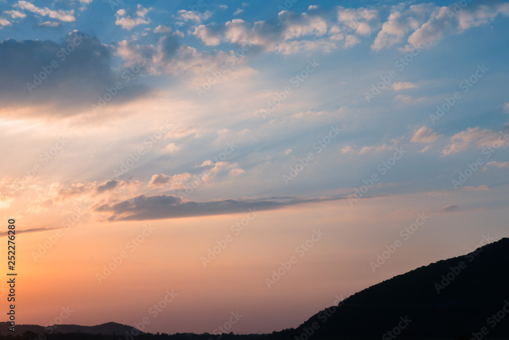 Fototapeta premium Sunset near a mountain