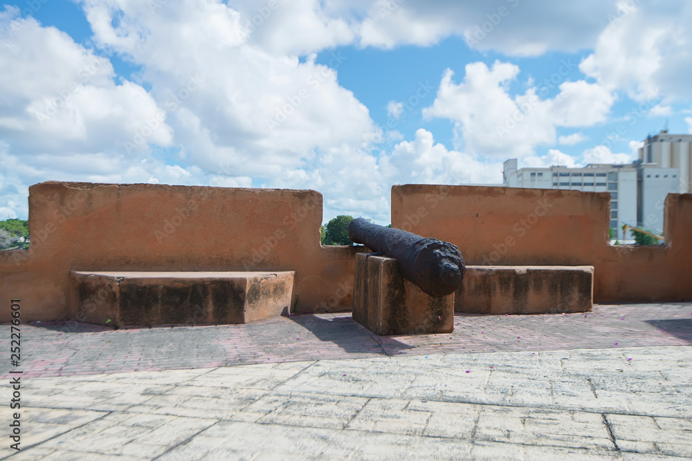 Old cannon standing outdoors in Santo Domingo