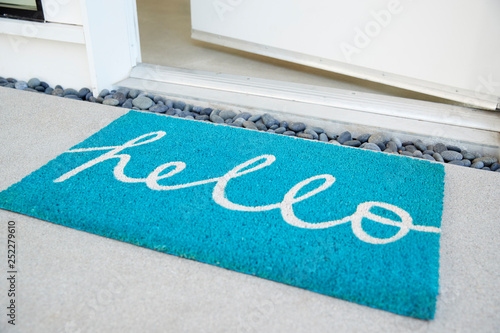 Doormat Outside Open Front Door Of House photo