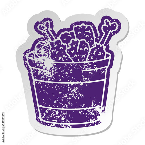 distressed old sticker bucket of fried chicken