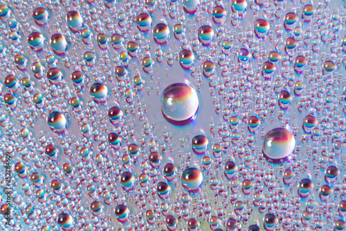 water drops on dvd media, water drops on colorful background