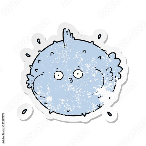 distressed sticker of a cartoon puffer fish