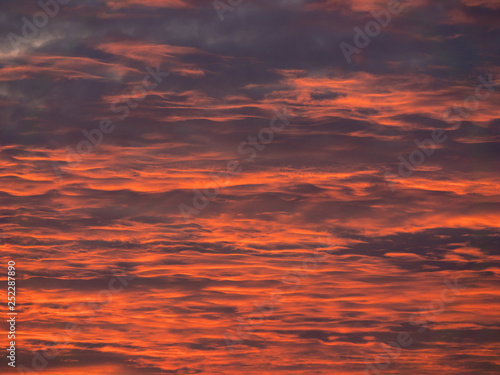 Image of red sunset clouds. background. flat lay © Alex