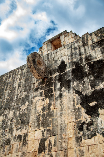 8 meter high rings embedded in the stone wall of The Great Ball Court were the goal for the hard rubber ball scoring on the grounds of the Maya Ruins of Chichen Itza