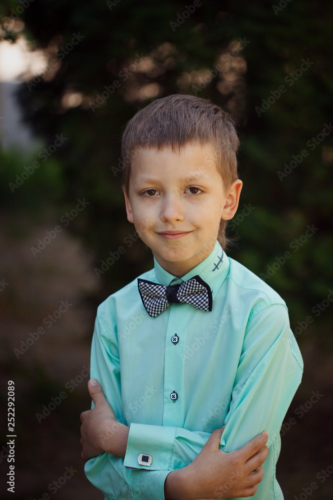 Portrait of a smile schoolboy in outside. Portrait of a smile schoolboy in outside.