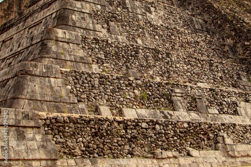 The mighty nine level stone pyramid of Temple of Kukulcan or El Castillo on the Chichen Itza archaeology site photo