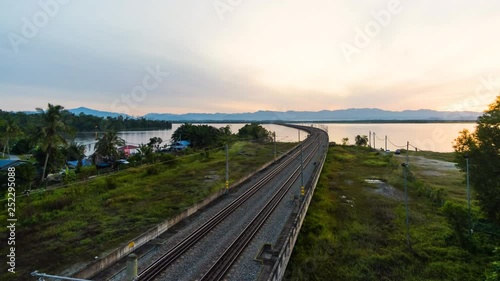 Time Lapse : Floating Railway Over Taiping Lake, Taiping,Malaysia During Sunrise. 4K photo