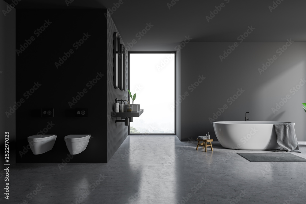 Gray bathroom interior, tub and toilets