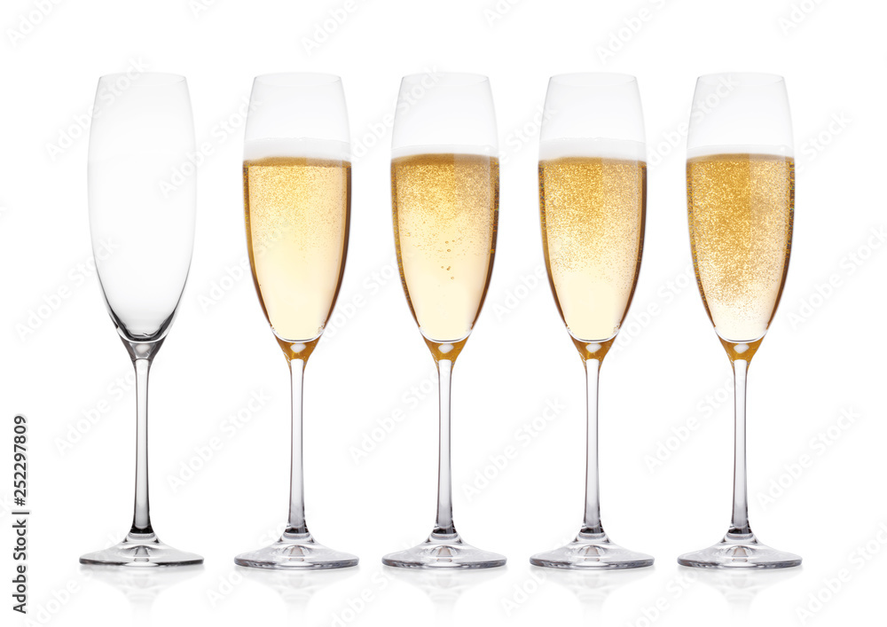 Elegant glasses of yellow champagne with bubbles Elegant glasses of yellow champagne with bubbles