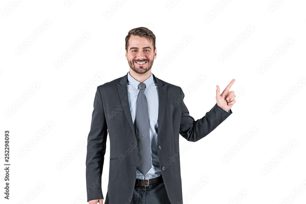 Smiling businessman pointing with finger, isolated Smiling businessman pointing with finger, isolated
