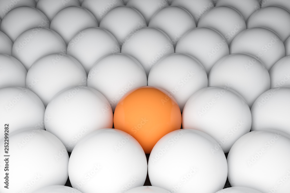 Orange sphere among white spheres Orange sphere among white spheres