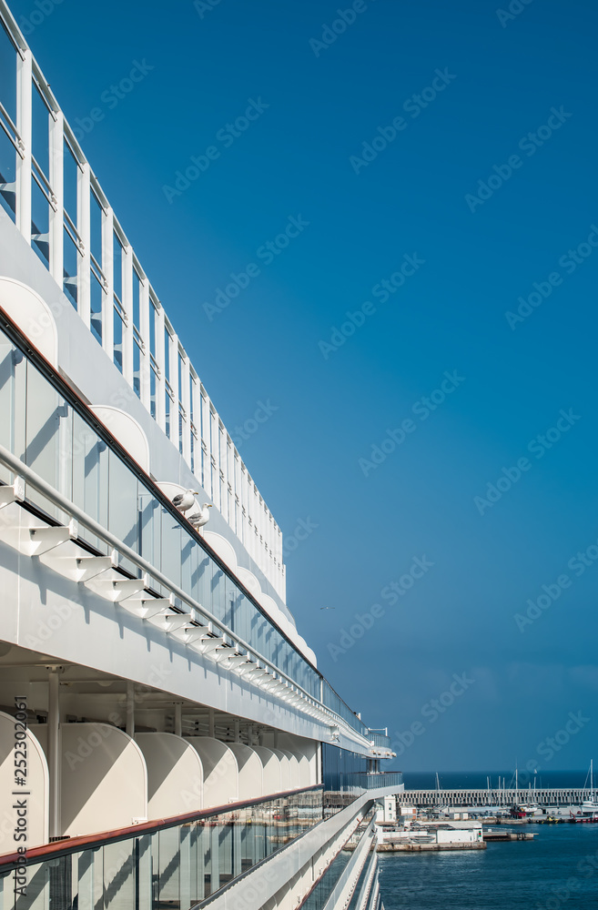 Side view of cruise ship against blue sky.