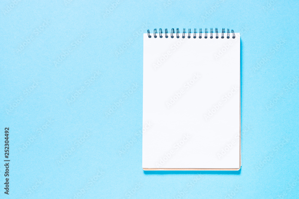 Notebook on blue top view. Notebook on blue top view.