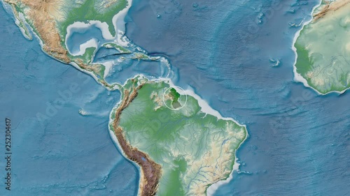 Guyana area presented against the global physical map in the Patterson Cylindrical projection with animated oblique transformation photo