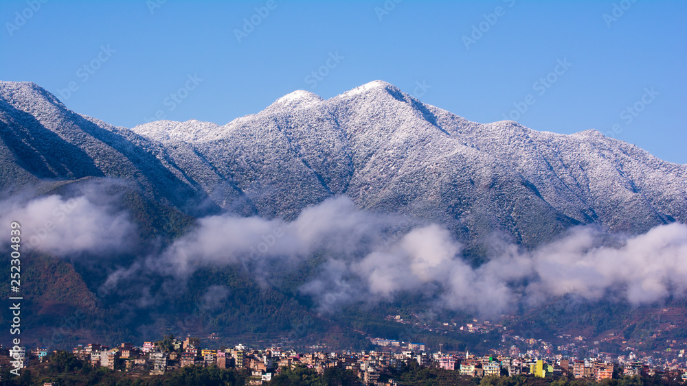Snow covered chandragiri hill and kritipur city majestic view, 28 Feb, 2019 Kathmandu Nepal