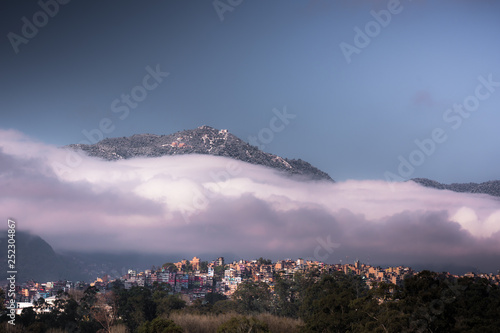 Snow covered chandragiri hill and kritipur city majestic view, 28 Feb, 2019 Kathmandu Nepal photo