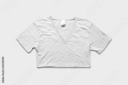 Blank White T-Shirts Mock-up on soft gray background, front  view. Ready to replace your design.High resolution photo. © sabir