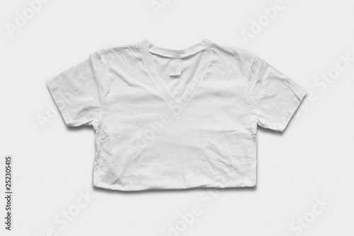 Blank White T-Shirts Mock-up on soft gray background, front  view. Ready to replace your design.High resolution photo. © sabir