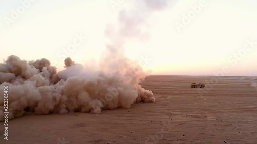 2017 - American soldiers conduct fire mission training drills with a High-Mobility Artillery Rocket System in a Syrian desert. photo