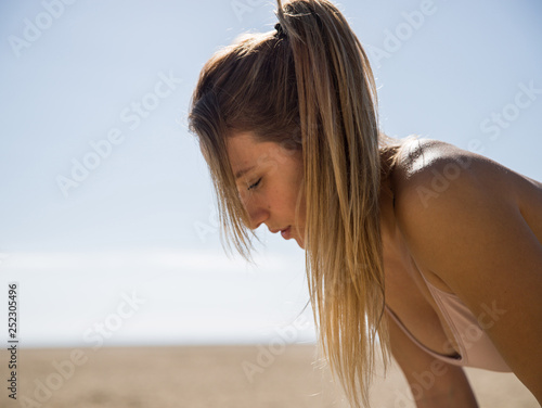 blondie woman having a rest after running