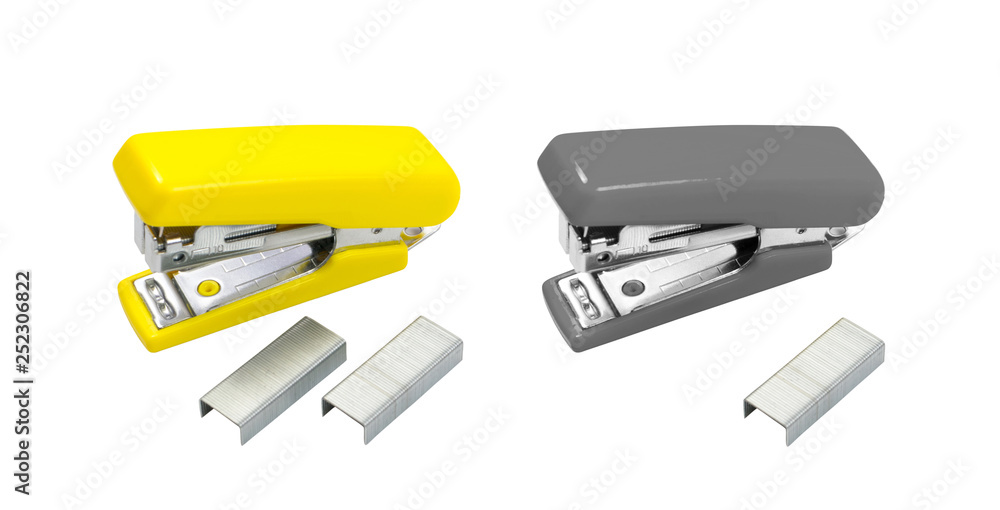 Yellow Office Stapler on Side with Staples Isolated Yellow Office Stapler on Side with Staples Isolated