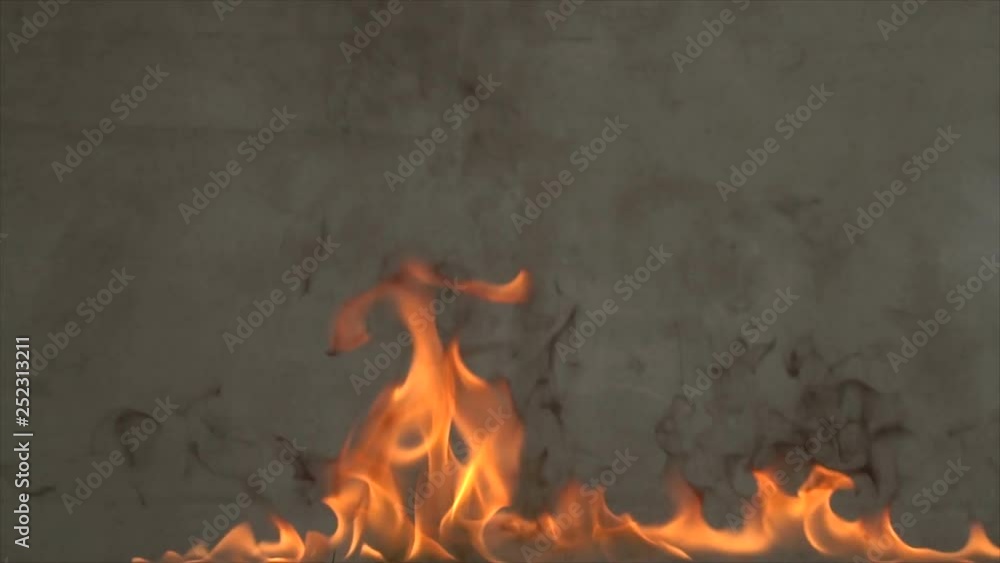 the fire burns on a gray background the fire burns on a gray background