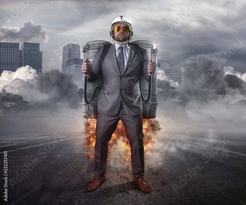 Jetpack businessman with city background photo