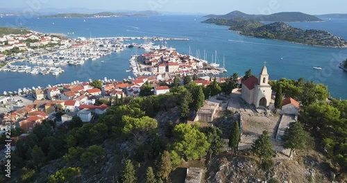 Wallpaper Mural Aerial View of the Harbor and Church of Tribunj - Croatia / Smooth drone Sho Torontodigital.ca