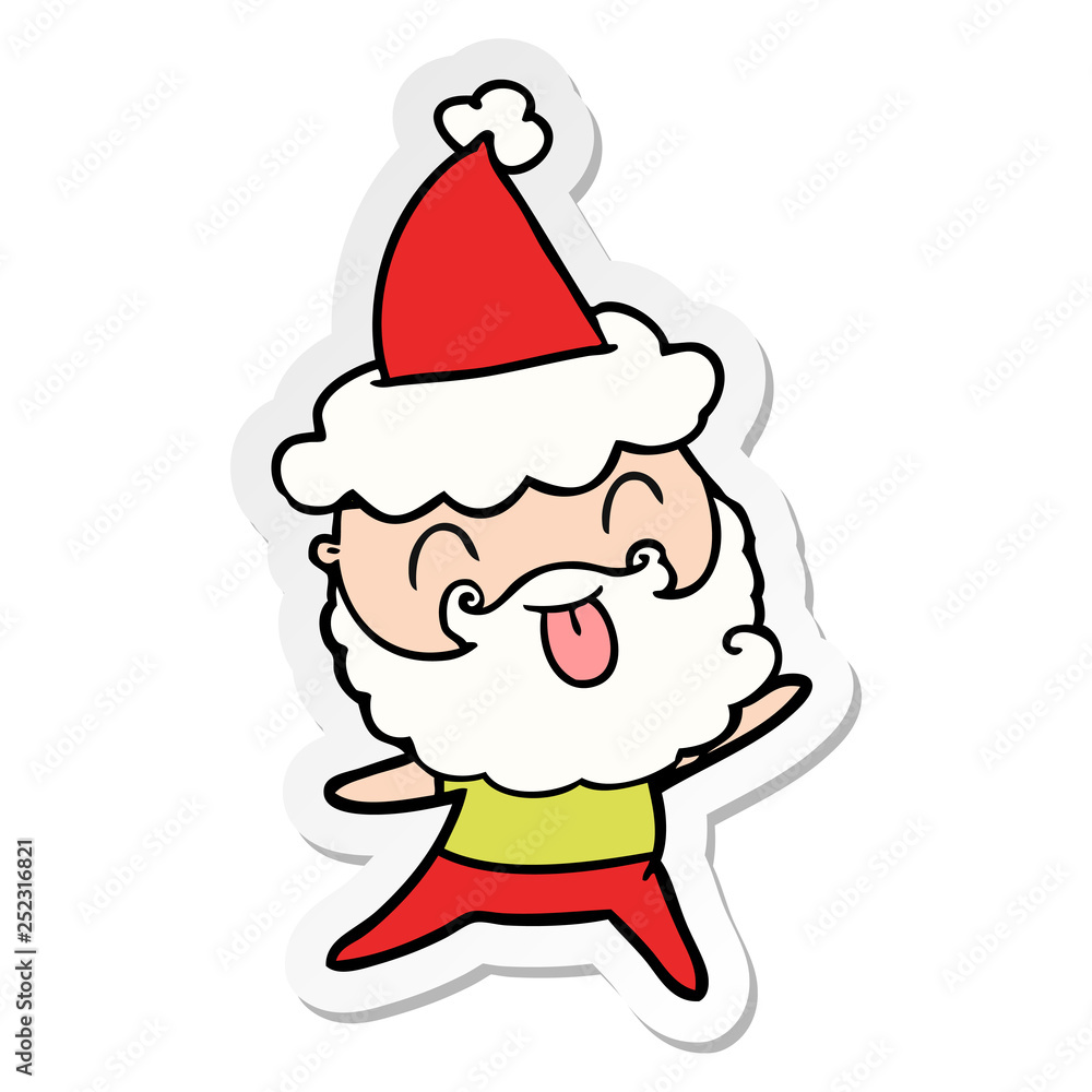 man with beard sticking out tongue wearing santa hat man with beard sticking out tongue wearing santa hat