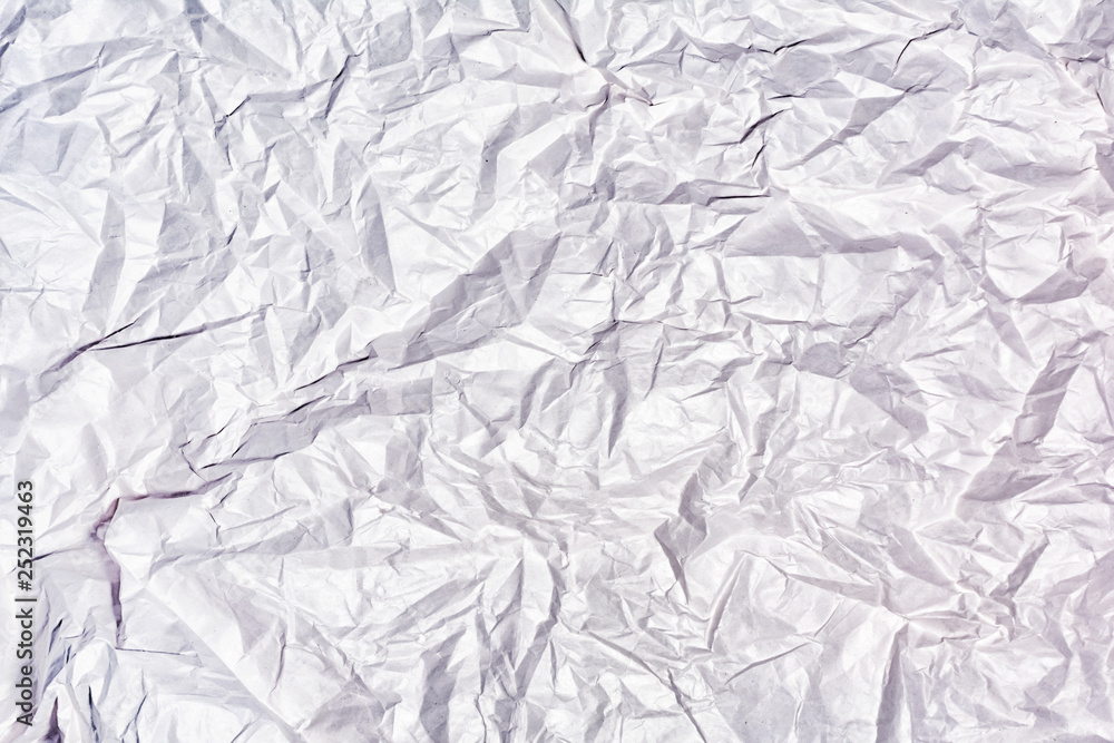 Texture of crumpled white paper close up. Blank abstract background. Texture of crumpled white paper close up. Blank abstract background.