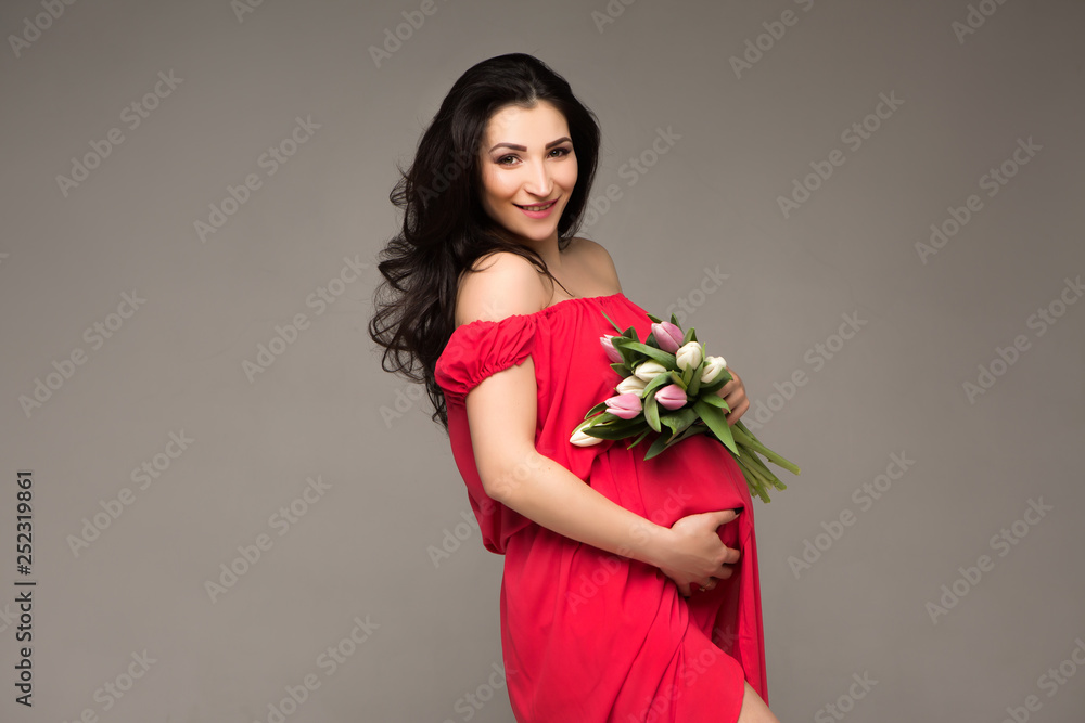 pregnant woman in light fabric,pregnant girl on a light background,pregnancy, rest, people and expectation concept - happy pregnant woman sitting, copy space pregnant woman in light fabric,pregnant girl on a light background,pregnancy, rest, people and expectation concept - happy pregnant woman sitting, copy space