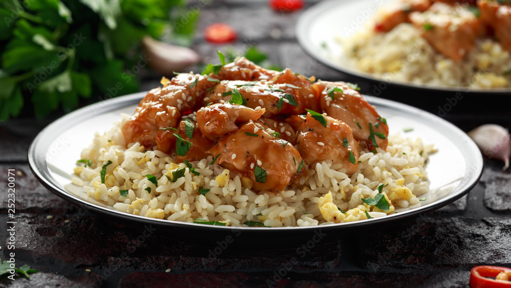 Orange Chicken Spicy sweet and sour with fried eggs rice. close up Orange Chicken Spicy sweet and sour with fried eggs rice. close up