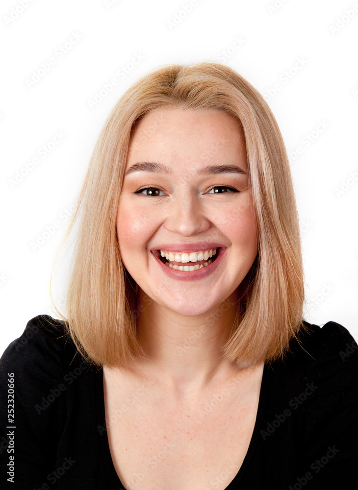 Young blonde woman smiling portrait on white background Young blonde woman smiling portrait on white background