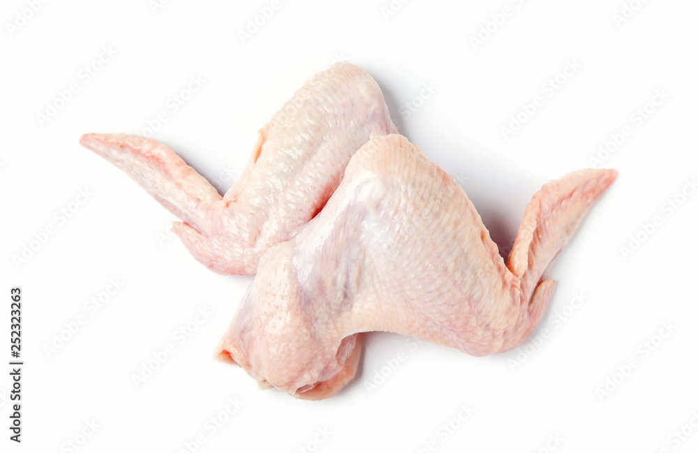 Raw chicken wings isolated on a white background. Top view. Raw chicken wings isolated on a white background. Top view.