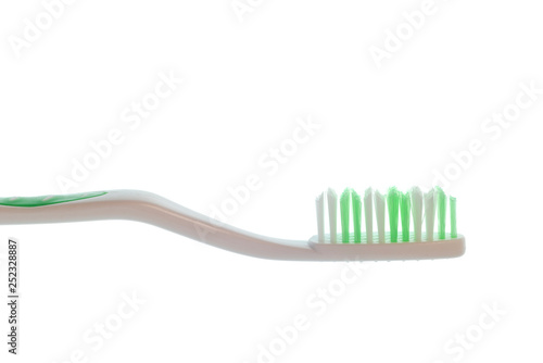 Close Up of Green Toothbrush Is Isolated On White.