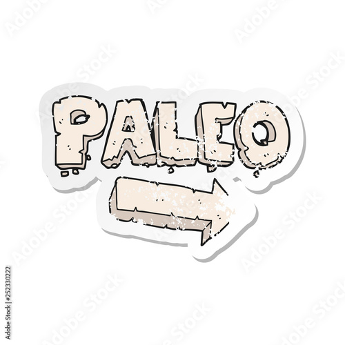 retro distressed sticker of a cartoon paleo diet pointing arrow