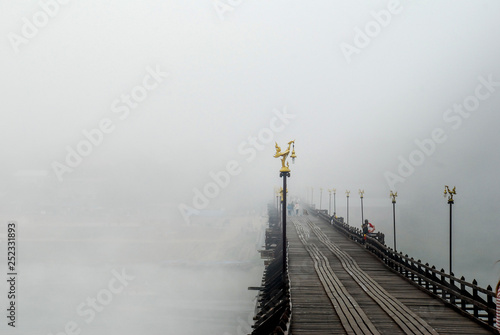 Old wooden bridge. Thailand photo