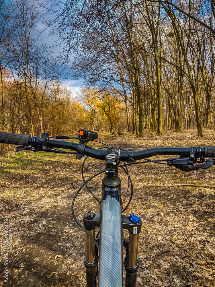MTB bicycle on the trail in the spring season MTB bicycle on the trail in the spring season