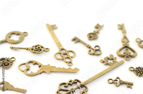 Decorative keys of different sizes, stylized antique on a white background. Form the centerpiece.