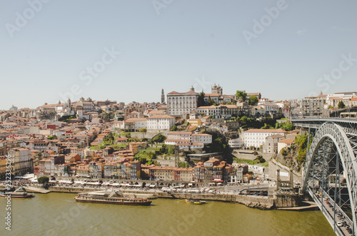 Beautiful Porto cityscape with river and boats